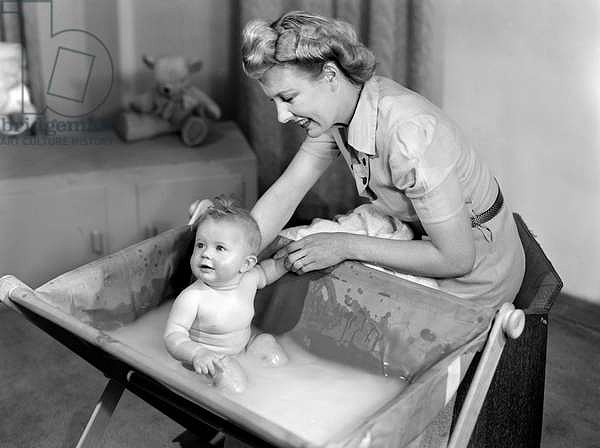 Woman-bathing-a-baby-1948-Science & Society Picture Library_Getty Images.jpg